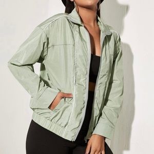 Light green windbreaker